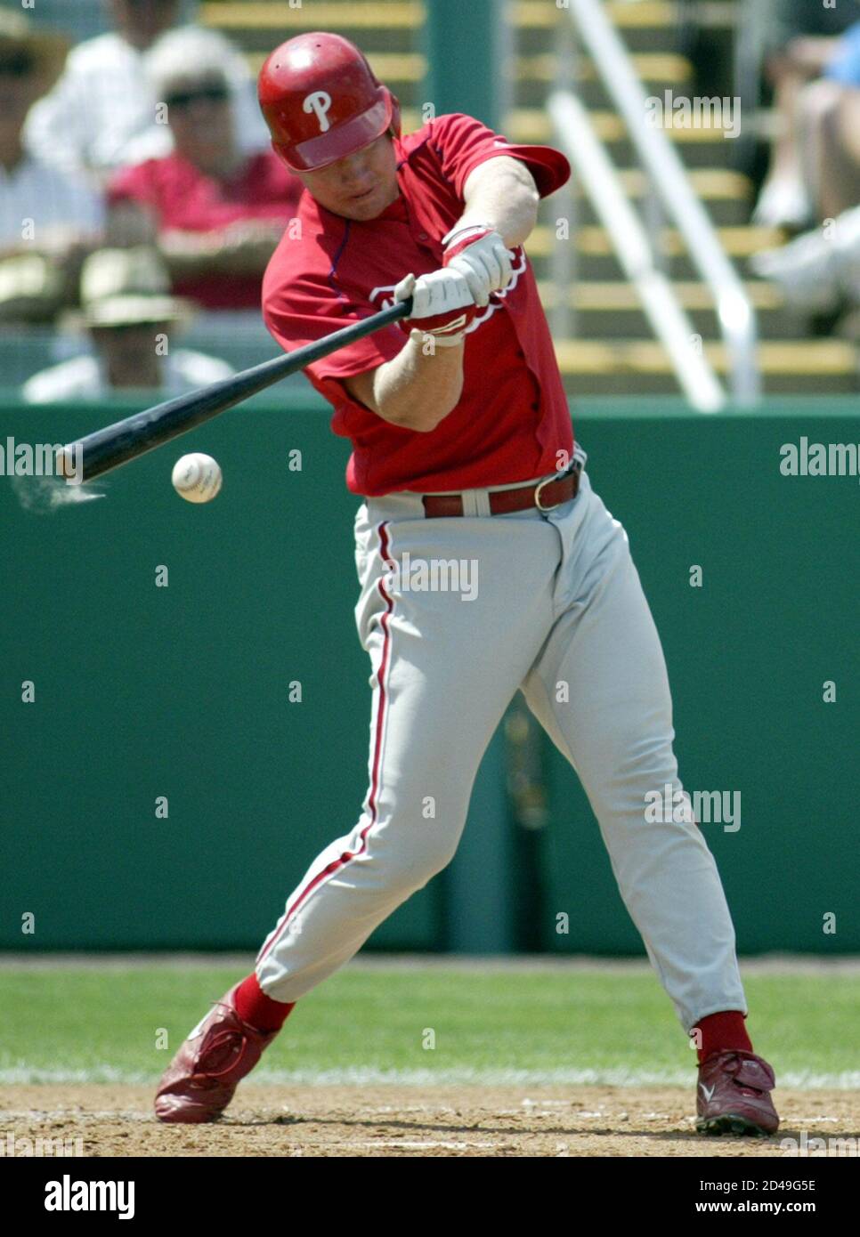 Philadelphia Phillies Russ Jacobson hits a two run single against the Minnesota Twins pitcher Rick Helling in the third inning, during Grapefruit League action in Ft. Myers, Florida, March 20, 2004. REUTERS/Marc Serota  MS Stock Photo