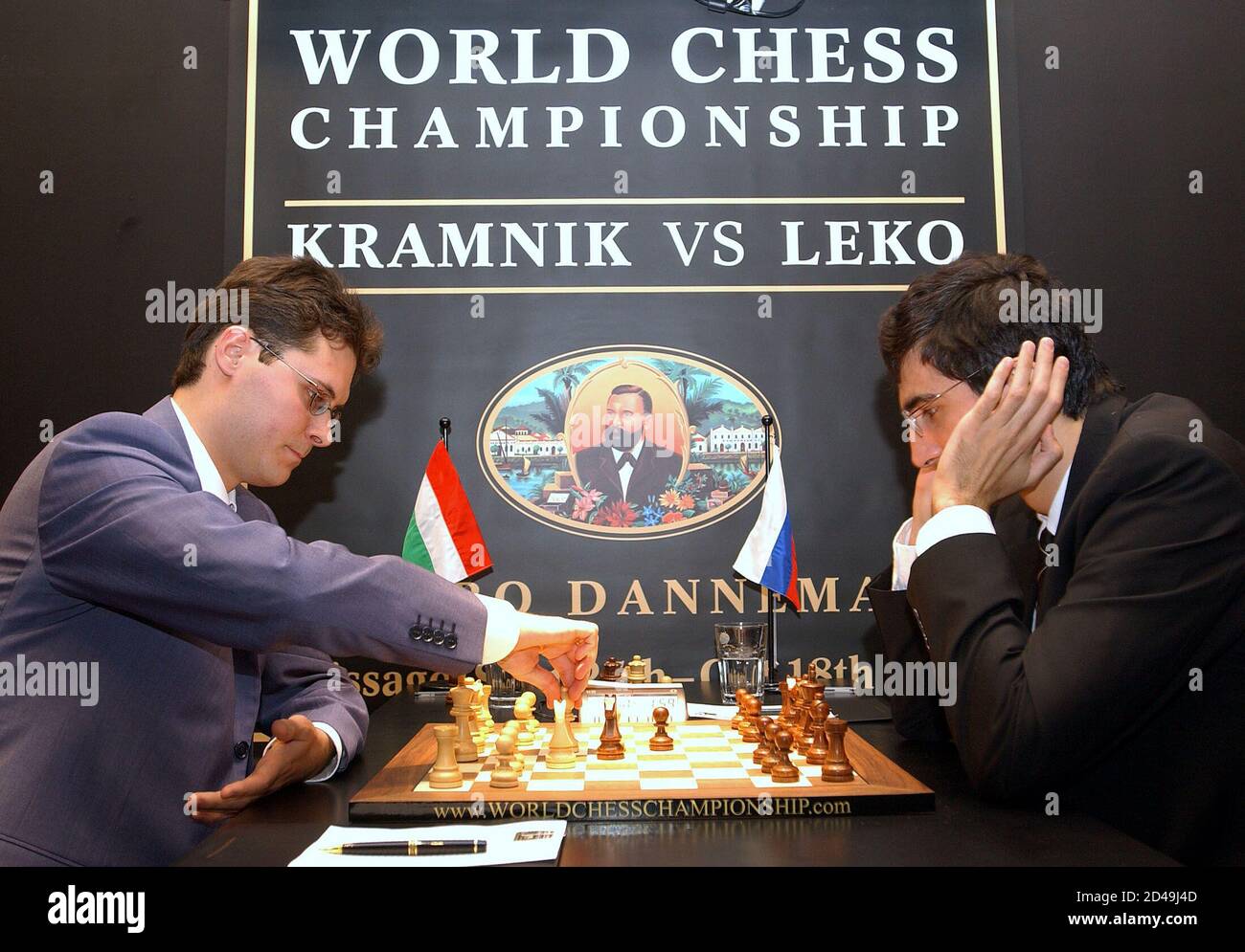 Peter Leko of Hungary moves a piece during the opening game of the World  Chess Championship in Brissago. Peter Leko (L) of Hungary moves a piece  while Classical World Chess Champion Vladimir