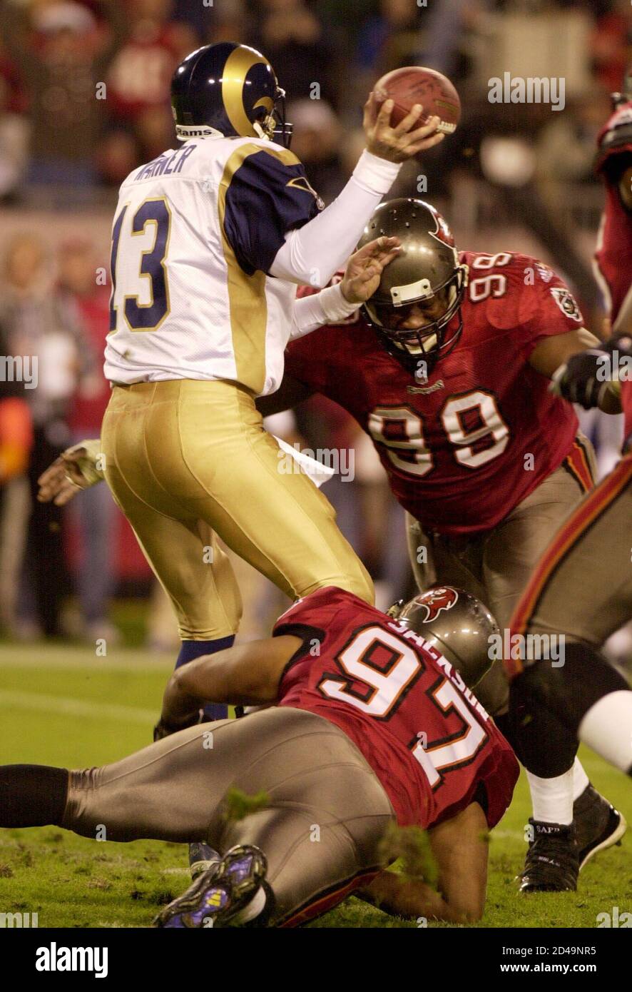 Tampa Bay Buccaneers Defenders Tyoka Jackson Below And Warren Sapp 99 Team Up To Sack St Louis Rams Quarterback Kurt Warner During First Half Action December 18 00 The Teams Met In Tampa Bay Buccaneers Defenders Tyoka Jackson Below And Warren Sapp 99 Team Up To Sack St Louis Rams Quarterback Kurt Warner During First Half Action December 18 00 The Teams Met In
