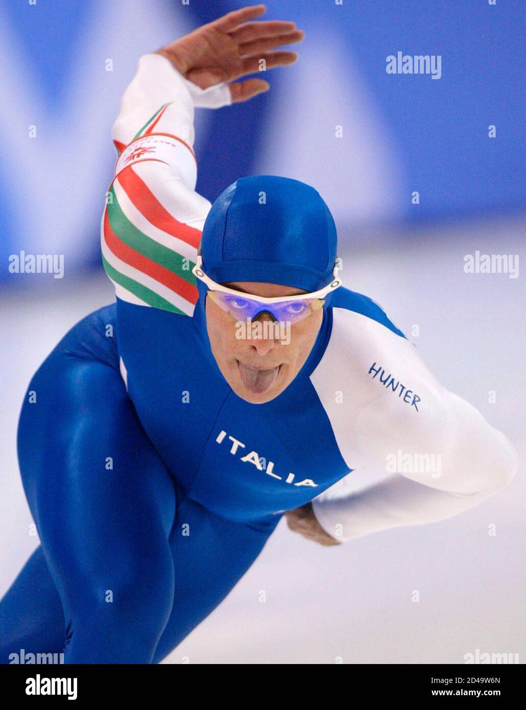 Italy speed skater Davide Carta races in the men's 1000 m competition at  the Salt Lake 2002 Olympic Winter Games, February 16, 2002. The Games run  through February 24. REUTERS/Mike Segar RR/HB