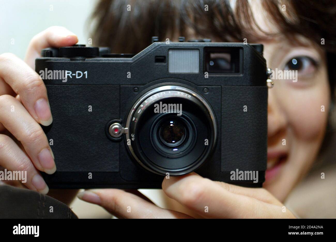 Seiko Epson Corporation's world's first rangefinder digial camera R-D1 is  displayed at a launch in Tokyo March 11, 2004. The  digital  camera, developed by Epson in partnership with Cosina Corp, accepts