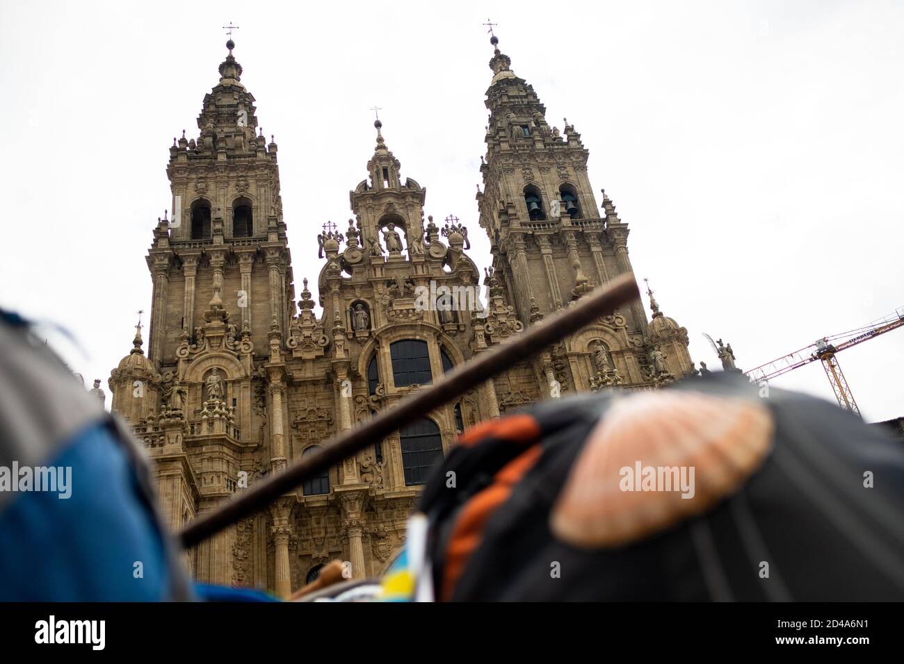 closeup of camino de santiago scallop shell in front of santiago de ...