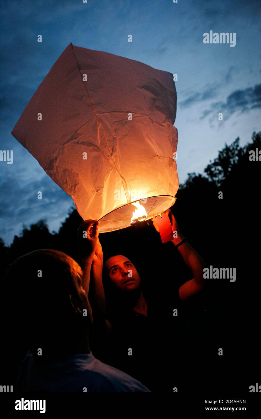 Sky lanterns released into the night sky in a commemorative celebration of life in Kent, UK
