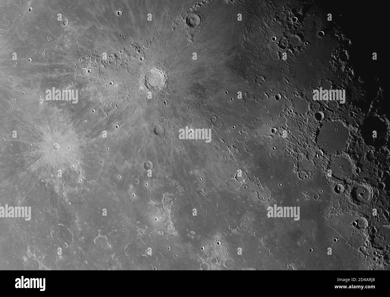 9 October 2020, London, UK. Closeup of Mare Nubium surface (centre right) with the three craters Ptolemaeus, Alphonsus and Arzachel in a diagonal line, lower right. The bright ray crater Copernicus is upper left of centre and crater Kepler with a large ray system is to the left. Stock Photo