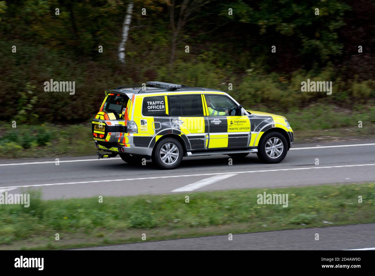 Highways England Traffic Officer vehicle joining M40 motorway at Junction 15, Warwickshire, UK Stock Photo