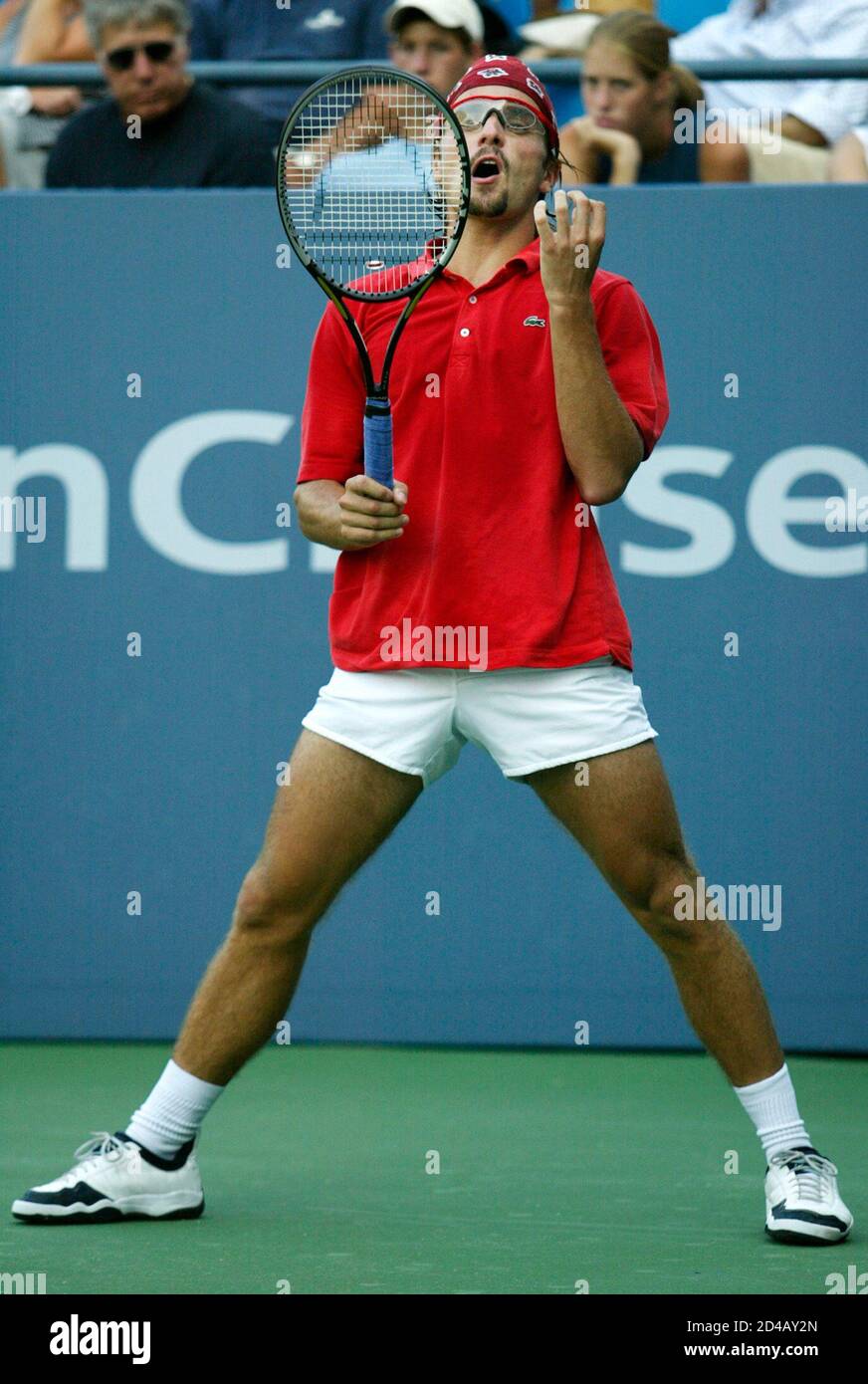 Arnaud Clement of France reacts after a missed point against Fernando  Gonzalez of Chile during their match at the U.S. Open in Flushing, New  York, September 3, 2002. Gonzalez defeated Clement 6-4