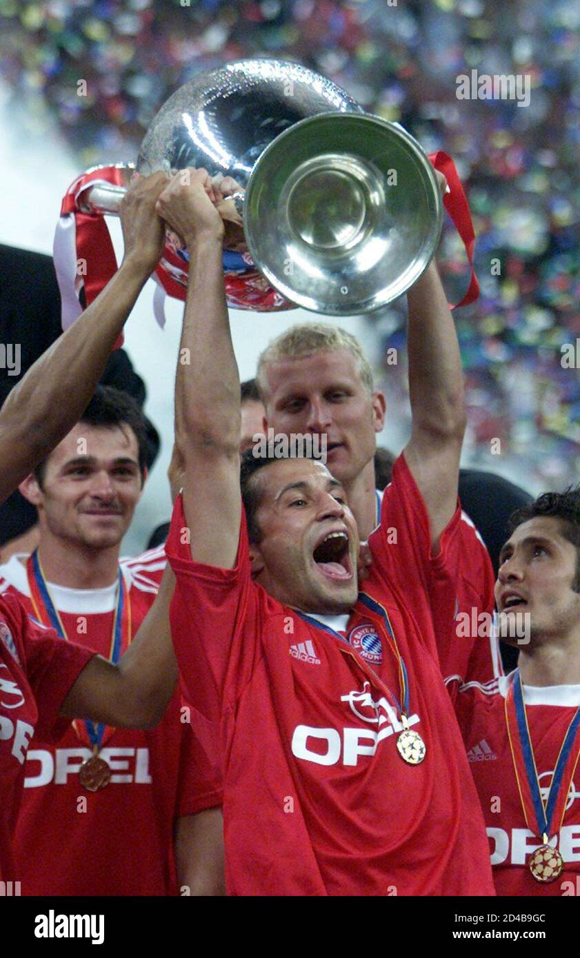 bayern-munichs-hasan-salihamidzic-from-bosnia-lifts-the-european-cup-in-the-san-siro-stadium-in-milan-may-23-2001-bayern-won-the-trophy-beating-valencia-5-4-on-penalties-2D4B9GC.jpg
