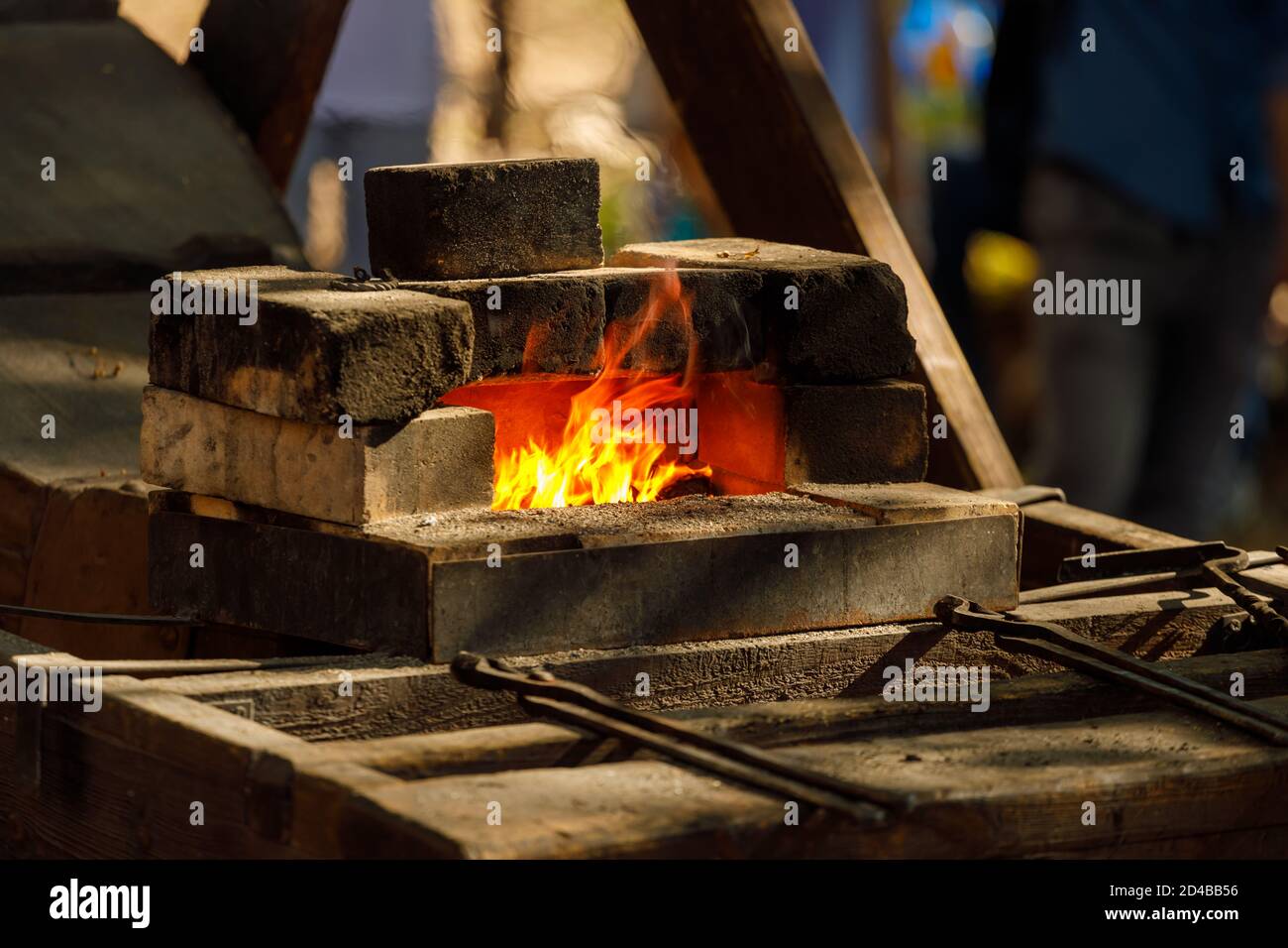 a burning forge made of bricks in nature Stock Photo