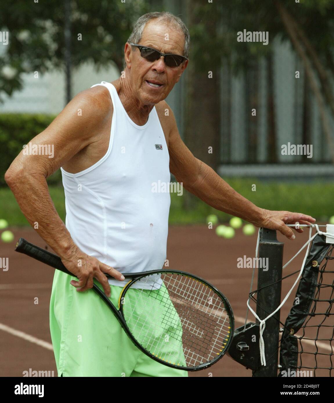 Nick Bollettieri gives instructions during practice with his students at  the Nick Bollettieri Tennis Academy in Bradenton, Florida in July 12, 2004.  Bollettieri Academy as trained past champions Andre Agassi, Monica Seles,