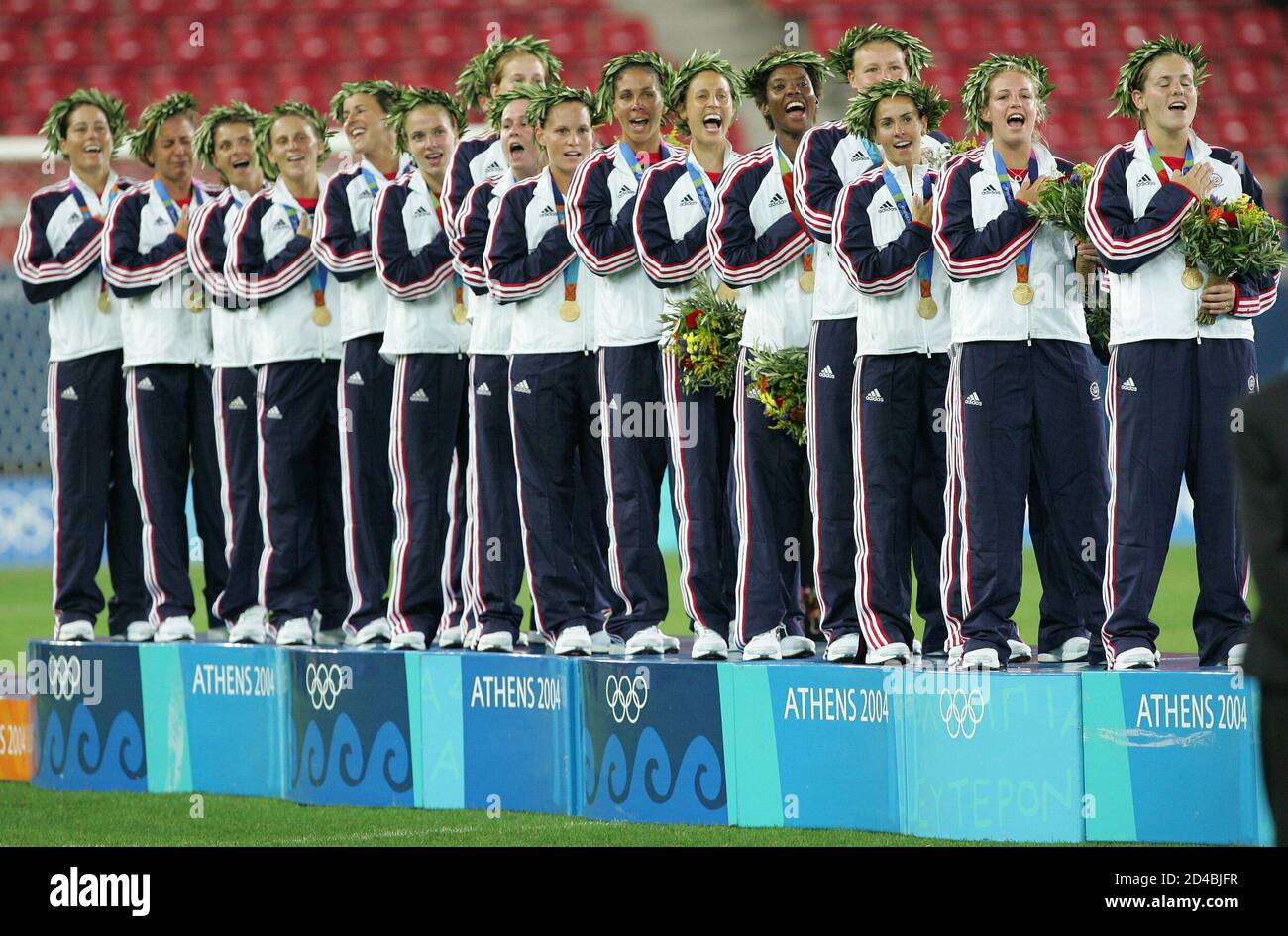 Players of the U.S. celebrates after winning the gold medal match against [Brazil] in the women's soccer competition at the Athens 2004 Olympic Summer Games August 26, 2004. [Brazil took the silver medal and Germany took the bronze.] Stock Photo