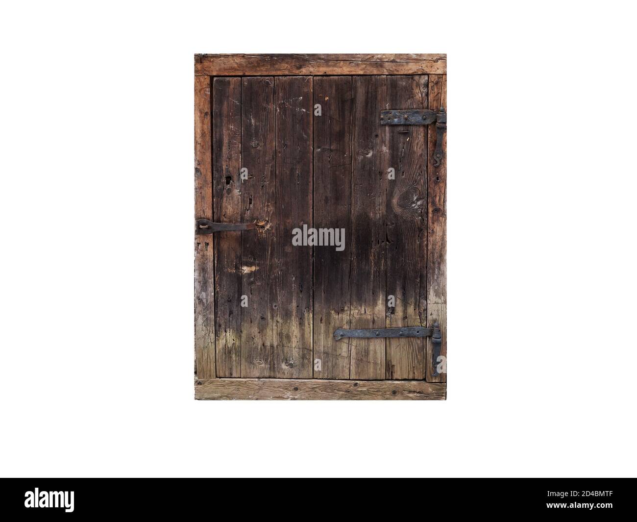 Old grungy dark wooden door isolated on white background Stock Photo