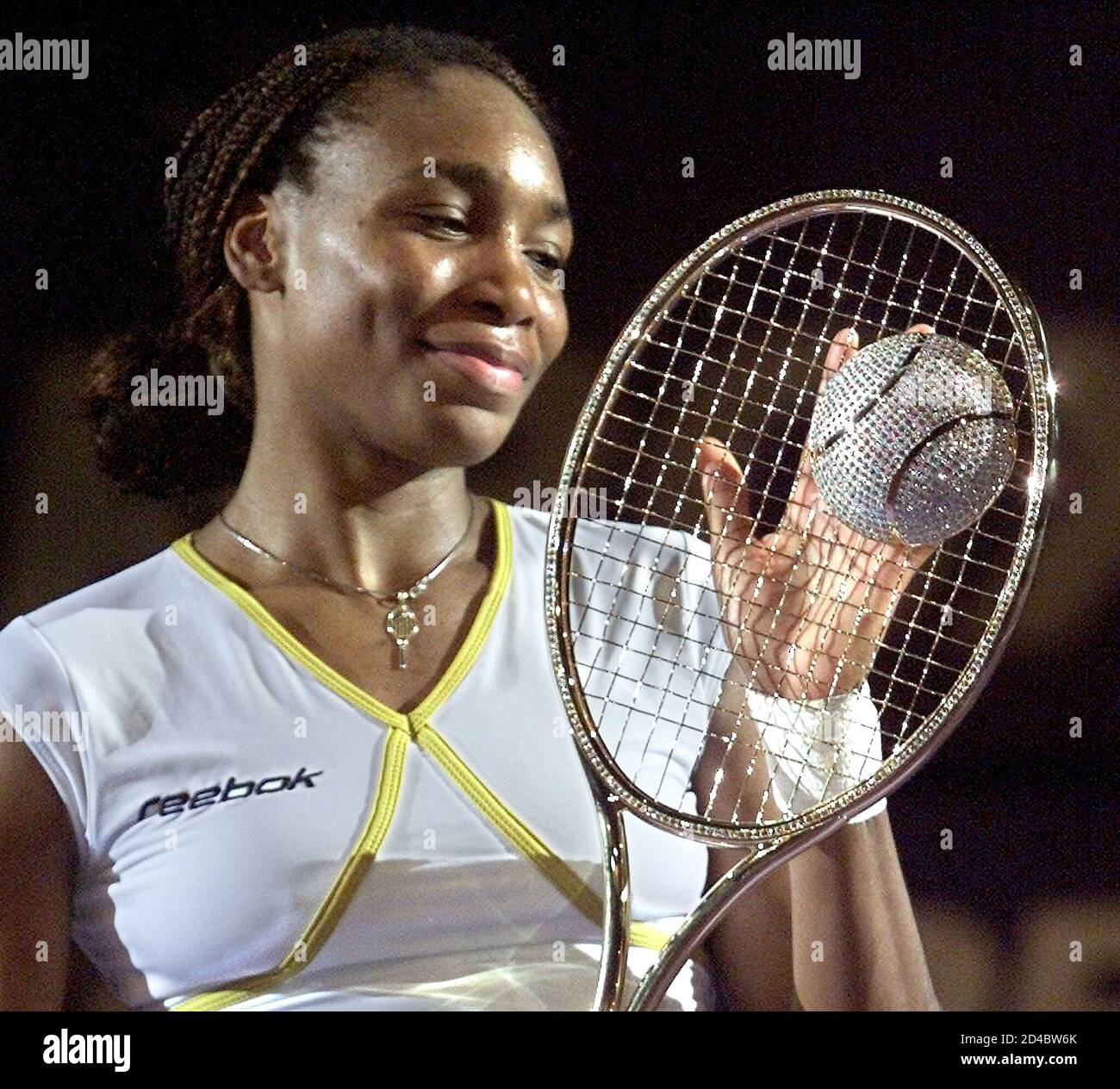 U.S. VENUS WILLIAMS LOOKS AT THE DIAMOND RACKET TROPHY AFTER DEFEATING  BELGIUM'S JUSTINE HENIN IN ANTWERP. U.S. Venus Williams looks at the Diamond  Racket trophy after defeating Belgium's Justine Henin in the