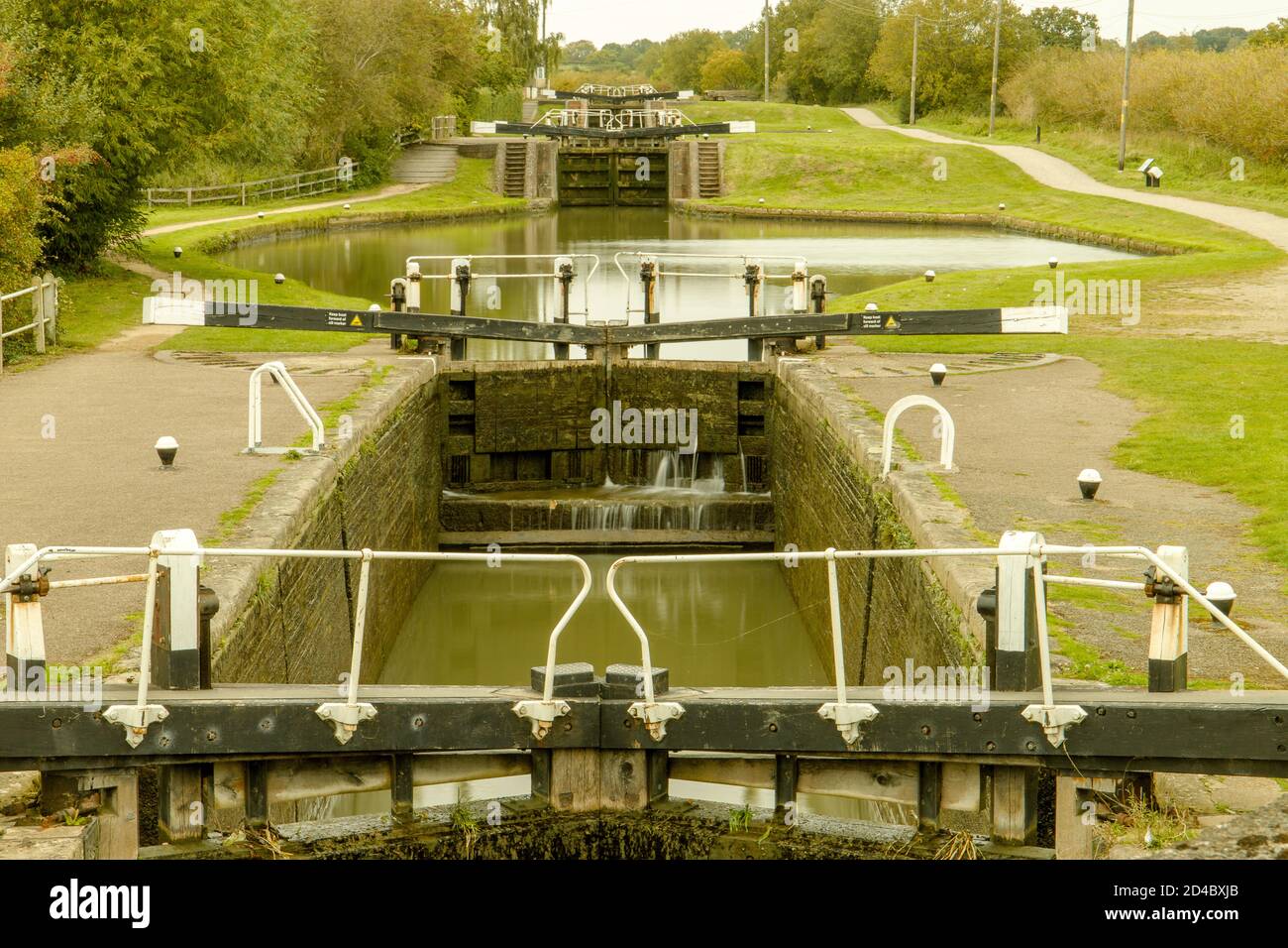 Set of lock gates on the Grand Union Canal Stock Photo Alamy