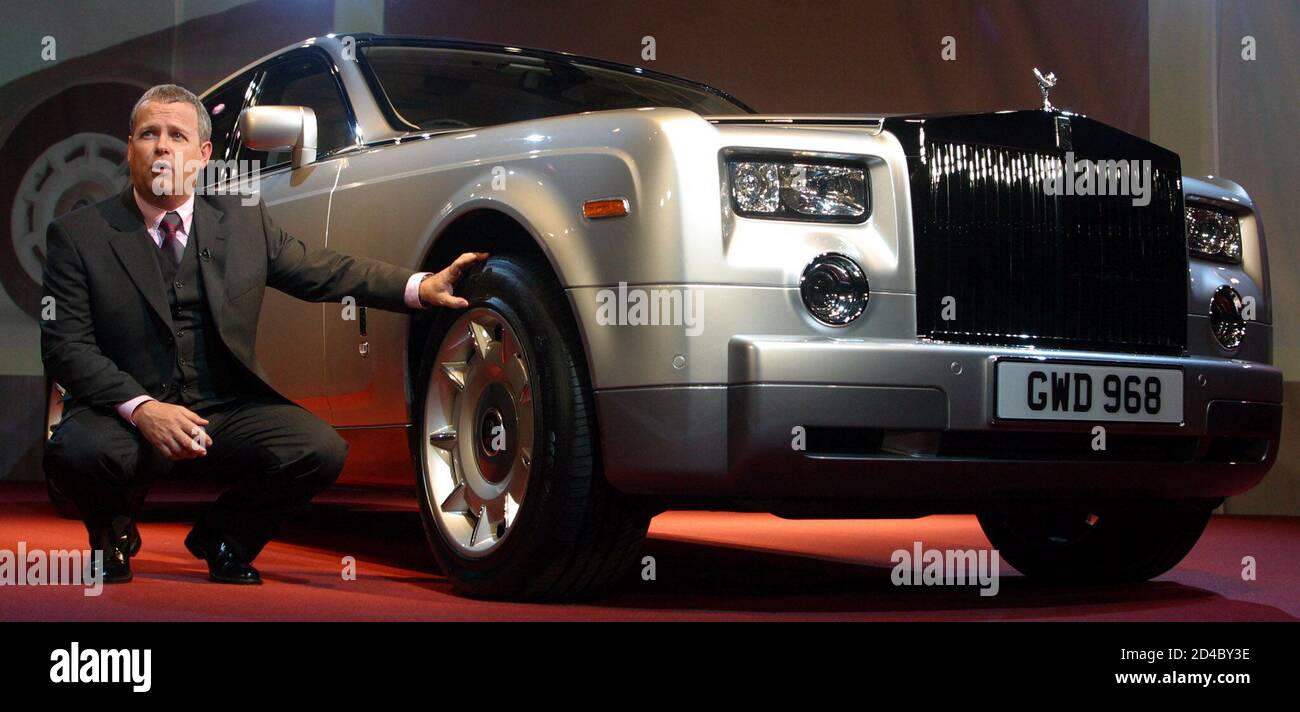 LEVERTON CHIEF ENGINEER OF ROLLS ROYCE POSES WITH THE NEW ROLLS ROYCE  PHANTOM AT ITS MANUFACTURING PLANT IN GOODWOOD. Tim Leverton, chief  engineer of Rolls-Royce, poses for photographs at the unveiling of