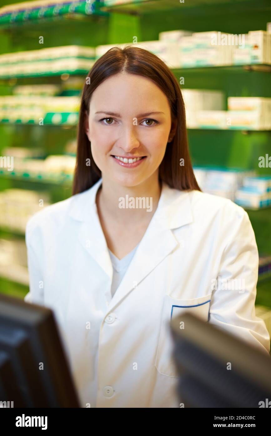 Pharmacist stands behind counter hi-res stock photography and images ...