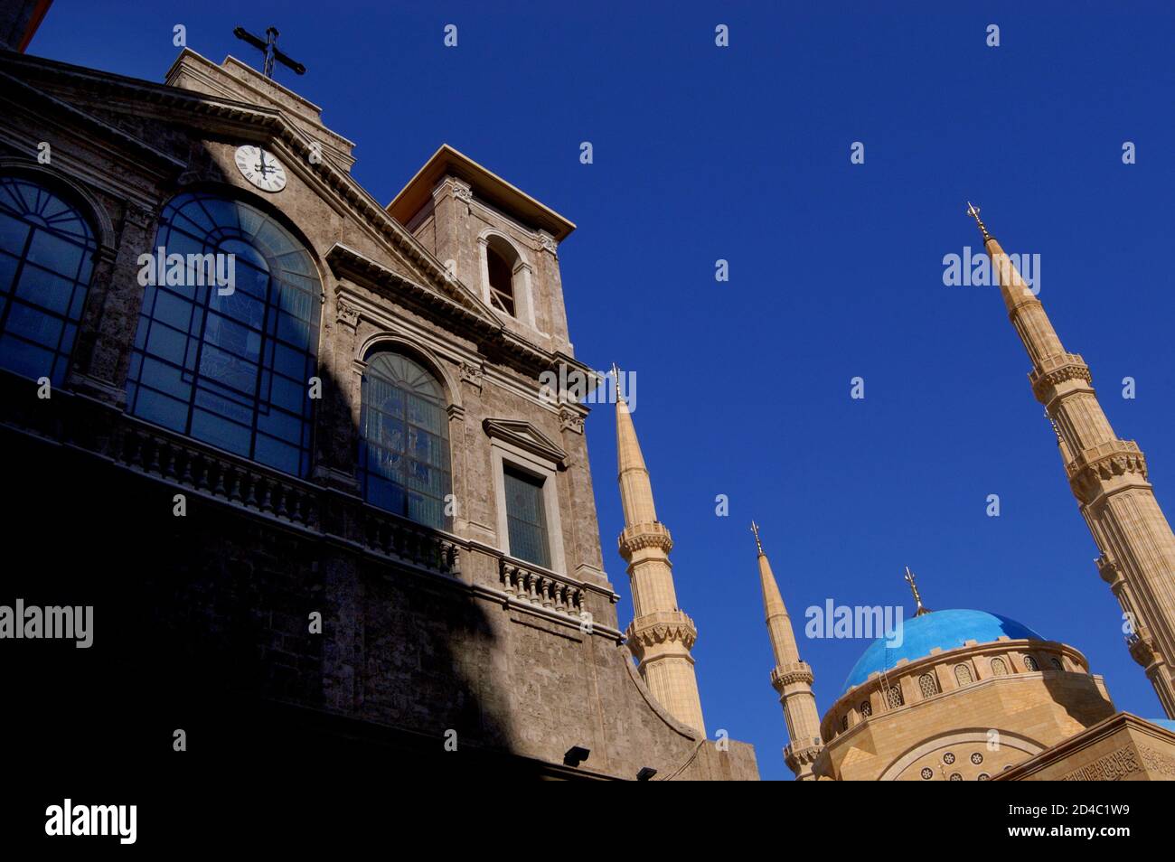 View of the Saint George Maronite Cathedral and Mohammad al-Amin Mosque in Downtown Beirut. Stock Photo