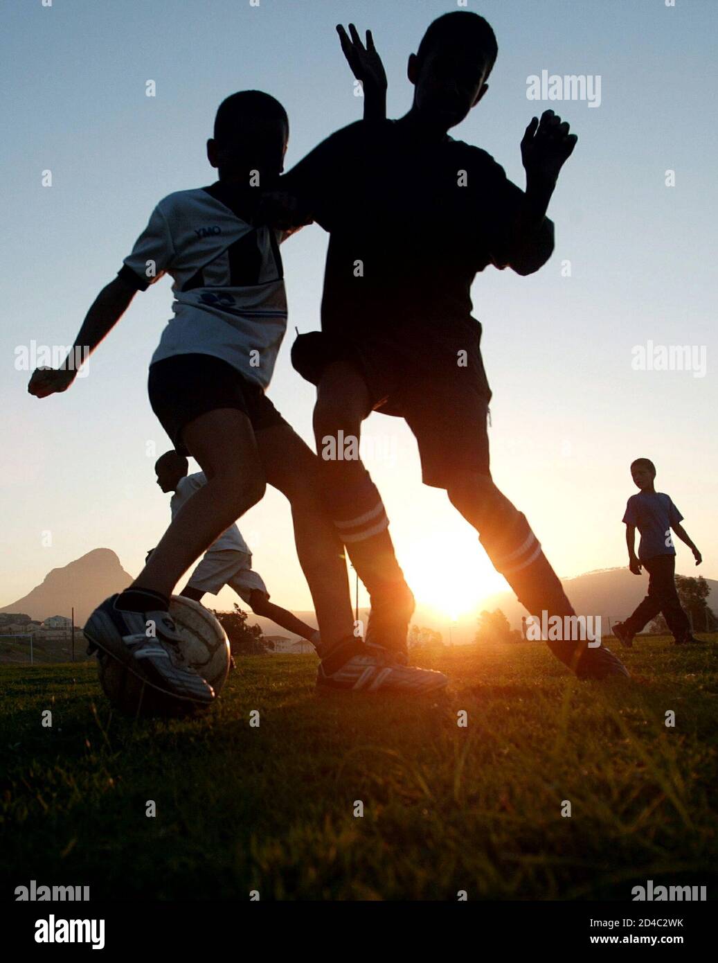 Aspiring soccer stars train in Cape Town, May 8, 2004. For thousands of  young players accross the country, [their dream is to be part of the  national team "Bafana Bafana" at the