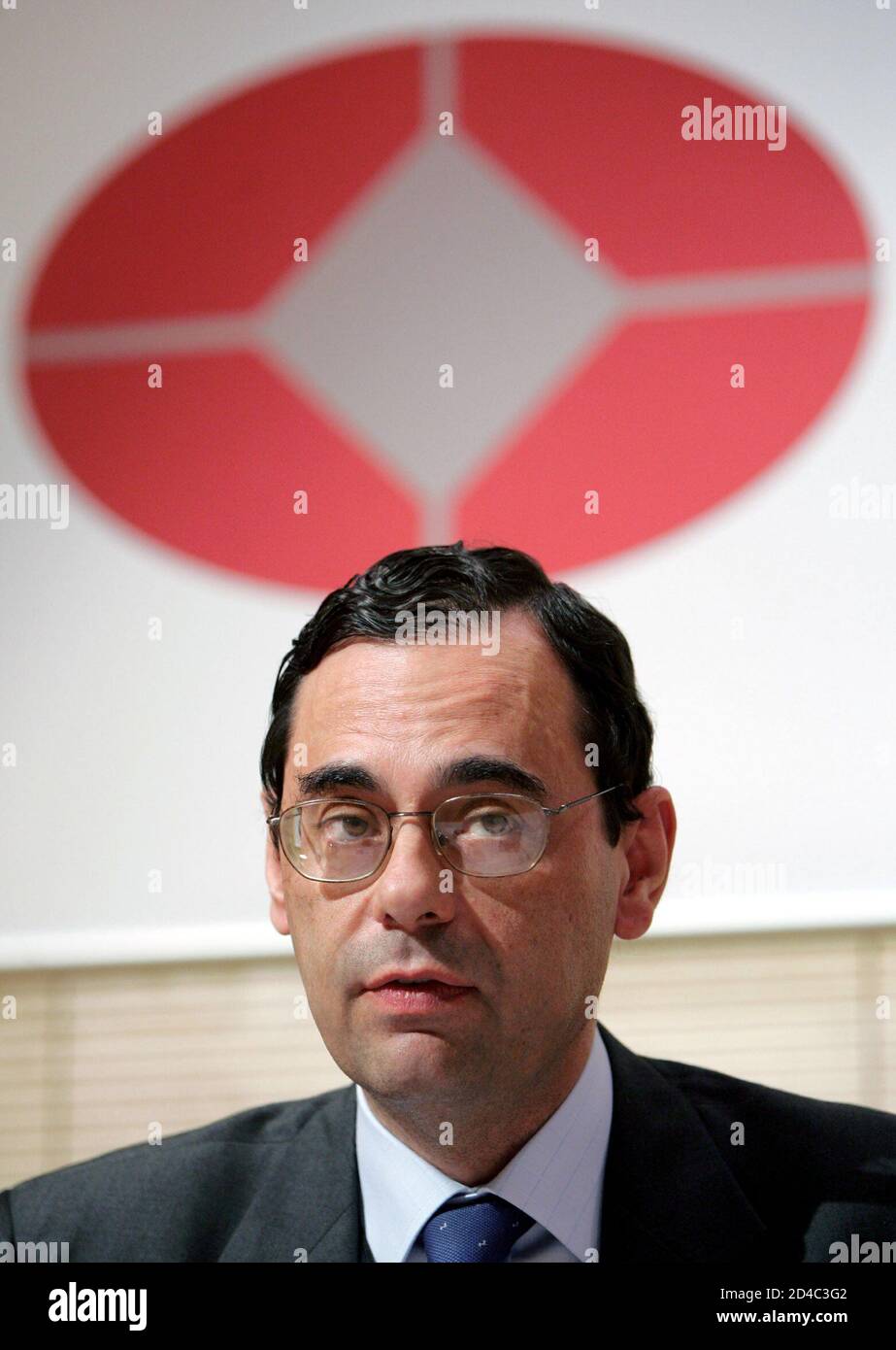Jaime Caruana, Governor of the Bank of Spain and Chairman of the Basel Committee on Banking Supervision attends a news conference at the Bank For International Settlements (BIS) in Basel, June 26, 2004. [Central bank governors and the heads of bank supervisory authorities in the Group of Ten (G10) industrialised nations approved a sweeping rewrite of global safety rules known as Basel II.] Stock Photo