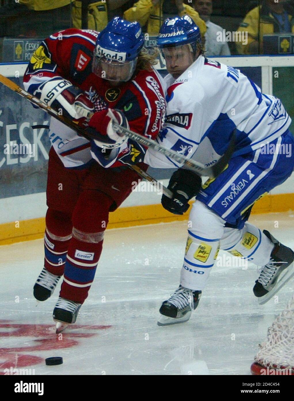 Czech Petr Sykora of Anaheim challenges Finland's Kimmo Timonen of Nashville Predators during the friendly ice hockey match.  Czech Republic's Petr Sykora (L) challenges Finland's Kimmo Timonen during the friendly ice hockey match between the Czech Republic and Finland in Prague, August 23, 2004. The match ended in 1-1 tie. REUTERS/Petr Josek Stock Photo