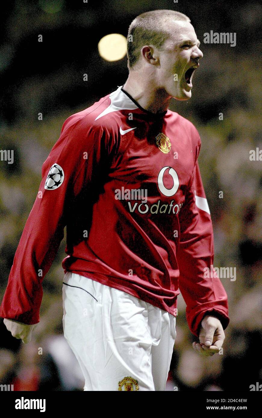 Manchester United's Rooney celebrates scoring a hat-trick against  Fenerbahce in their Champions League match at Old Trafford. Manchester  United's Wayne Rooney celebrates scoring a hat-trick on his team debut  against Fenerbahce in