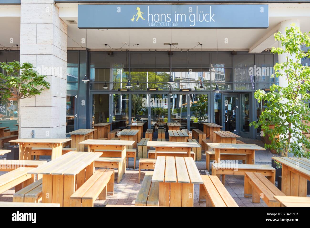 COLOGNE; May 2020: Closed Burger restaurant Hans im Glueck with benches outdoors Stock Photo