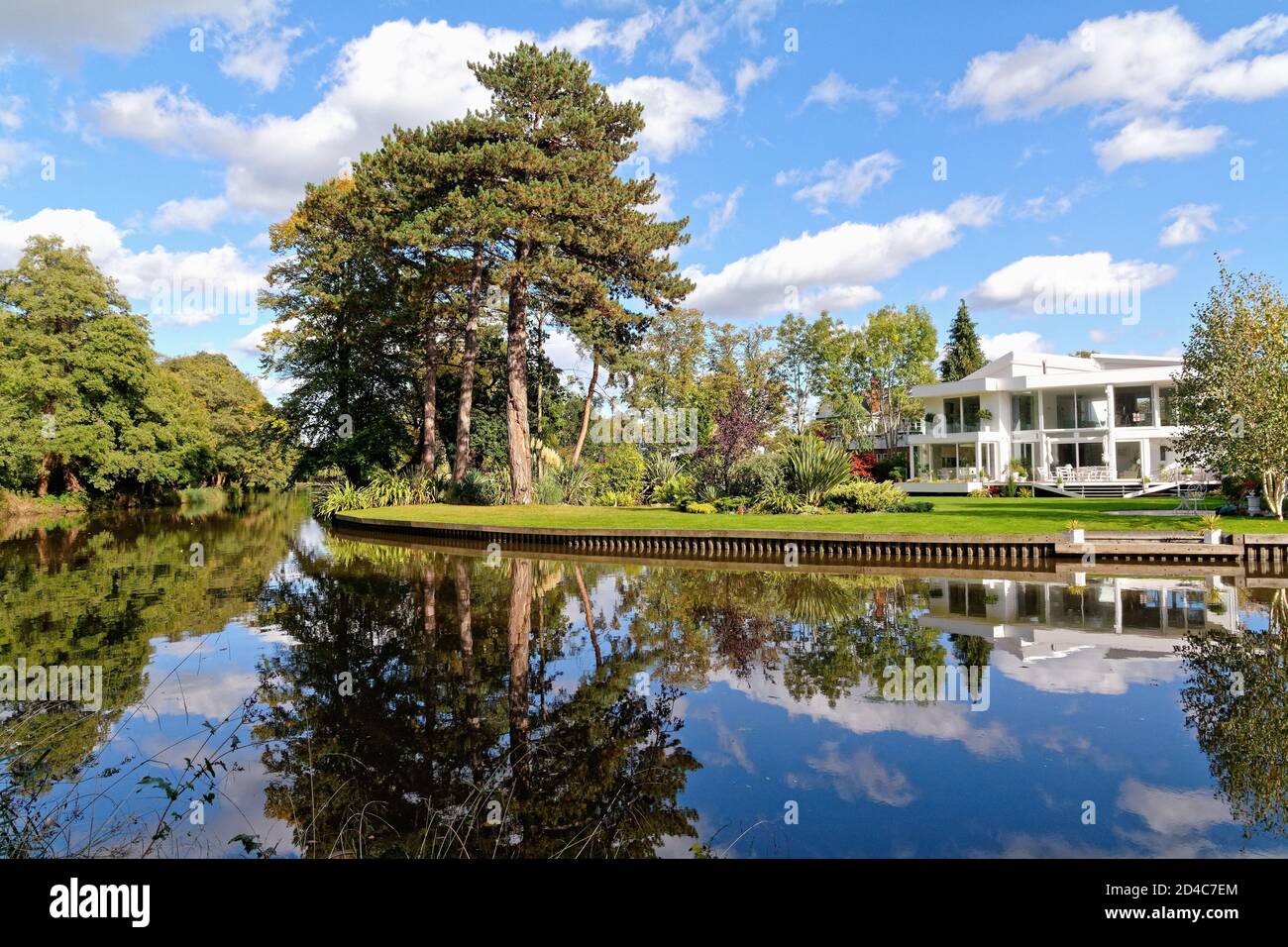A very modern styled unique exclusive home on the banks of the River Wey navigation canal at