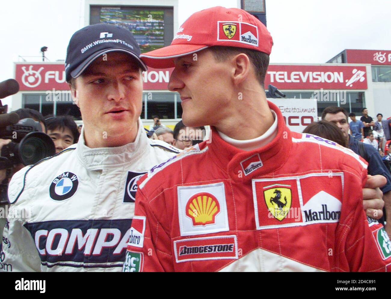 Michael Schumacher R Of Germany Talks With His Younger Brother Ralf Schumacher Prior To The Japanese Formula One Grand Prix Race October 8 2000 In Suzuka Michael Schumacher Has Pole Position For