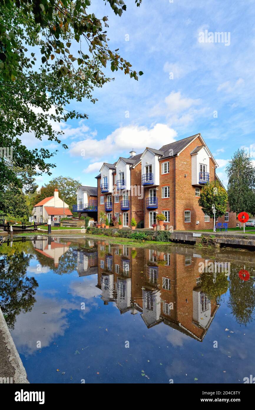 Modern apartments on the River Wey navigation canal at Thames Lock
