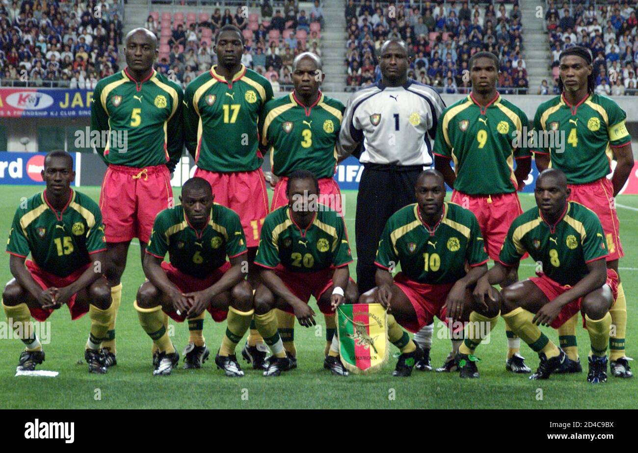 Cameroon national team starting members pose for a photograph ahead of the  match between Cameroon and Japan in the B group of the Confederations Cup  at the Big Swan Stadium in Niigata,