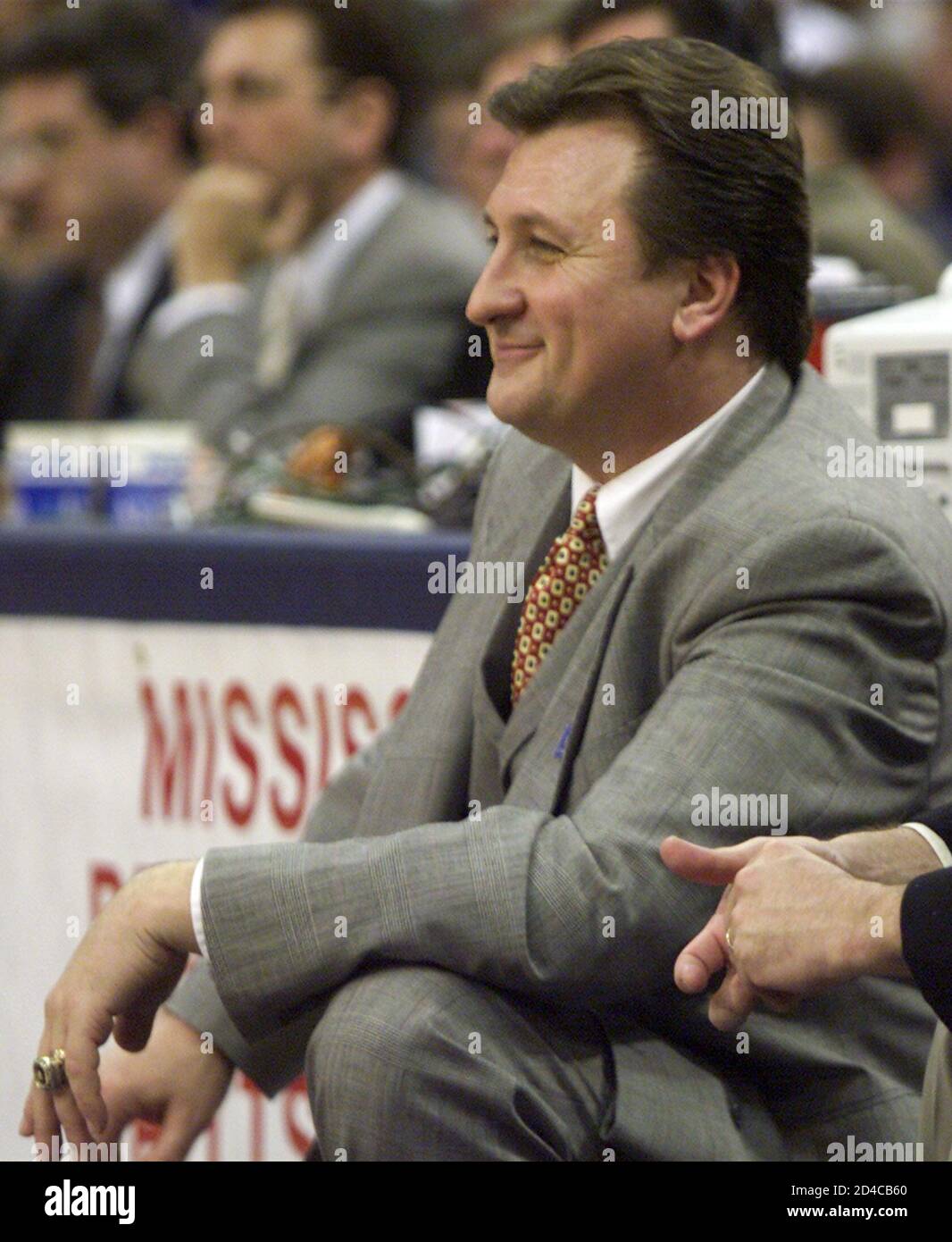University of Cincinnati head coach Bob Huggins smiles near the end of the first round of the NCAA West Regional game against Boston University in Pittsburgh on March 15, 2002. Cincinnati won University of Cincinnati head coach Bob Huggins smiles near the end of the first round of the NCAA West Regional game against Boston University in Pittsburgh on March 15, 2002. Cincinnati won