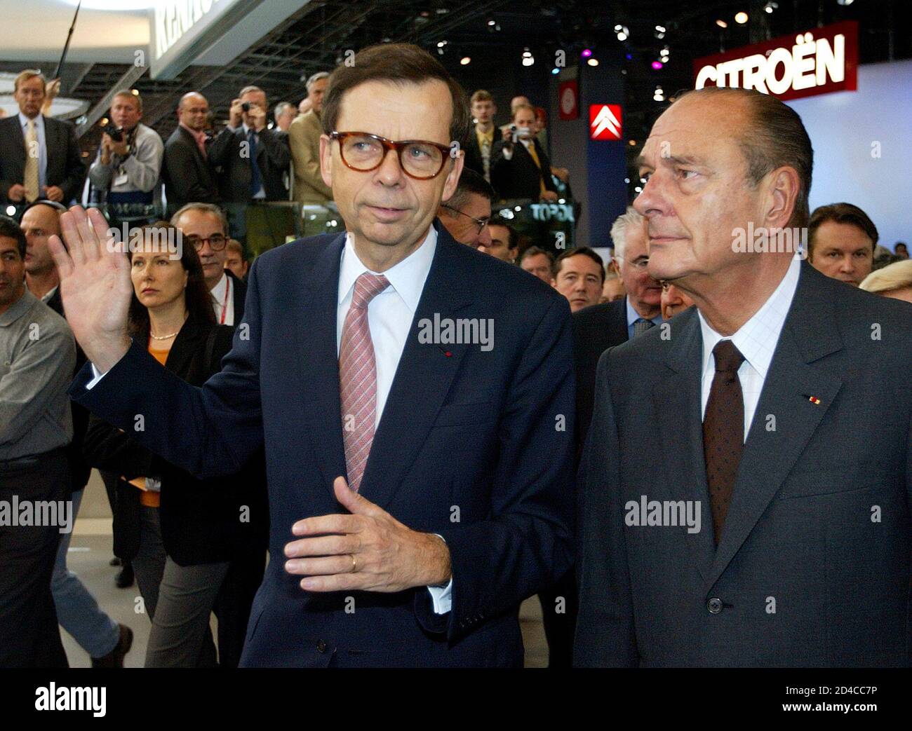French President Jacques Chirac R Walks With Renault Head Louis Schweitzer As He Toured The Paris Auto Show At The Porte De Versailles Exhibition Center September 27 02 The Paris Car Show