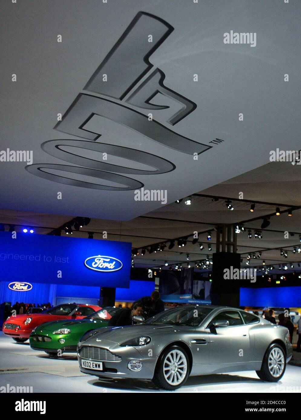 ford modified motor on A Ford Thunderbird A Modified 400 Bhp Jaguar Xkr Convertible And An Aston Martin Vanquish L R At The British International Motor Show At The Nec In Birmingham October 22 2002 The Motor