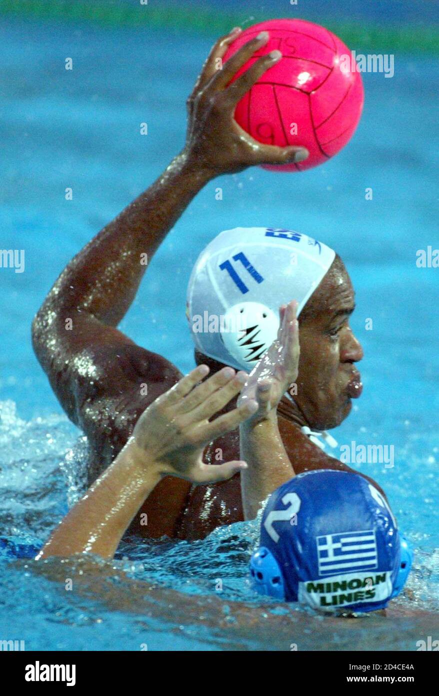 Ivan Perez (11) of Spain fights for the ball with Anastasios Schisaz (2) of  Greece during their European Waterpolo Championship match in Kranj June 7,  2003. REUTERS/Srdjan Zivulovic Stock Photo - Alamy