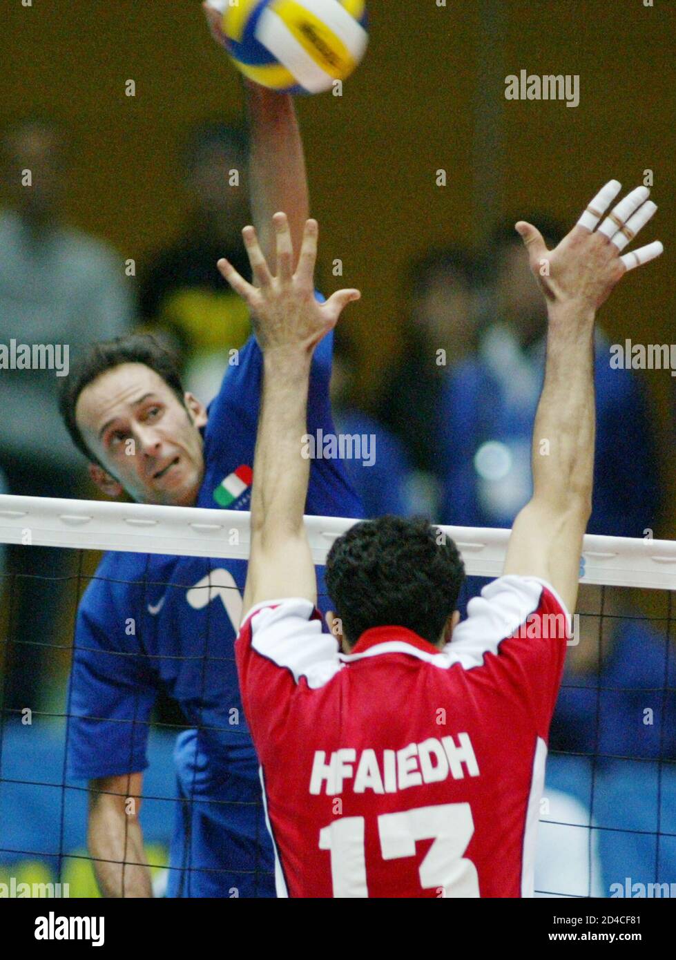 Andrea Sartoretti Of Italy Spikes The Ball Over Hfaiedh Of Tunisia During The Men S Volleyball World Cup In Nagano Central Japan Stock Photo Alamy