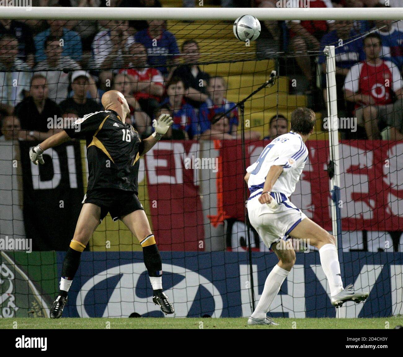 Greece S Angelos Haristeas R Scores A Goal Past France S Goalkeeper Fabien Barthez During Their Euro 04 Quarter Final Soccer Match At The Jose Alvalade Stadium In Lisbon June 25 04 Reuters Ruben Sprich Ph Thi Jes