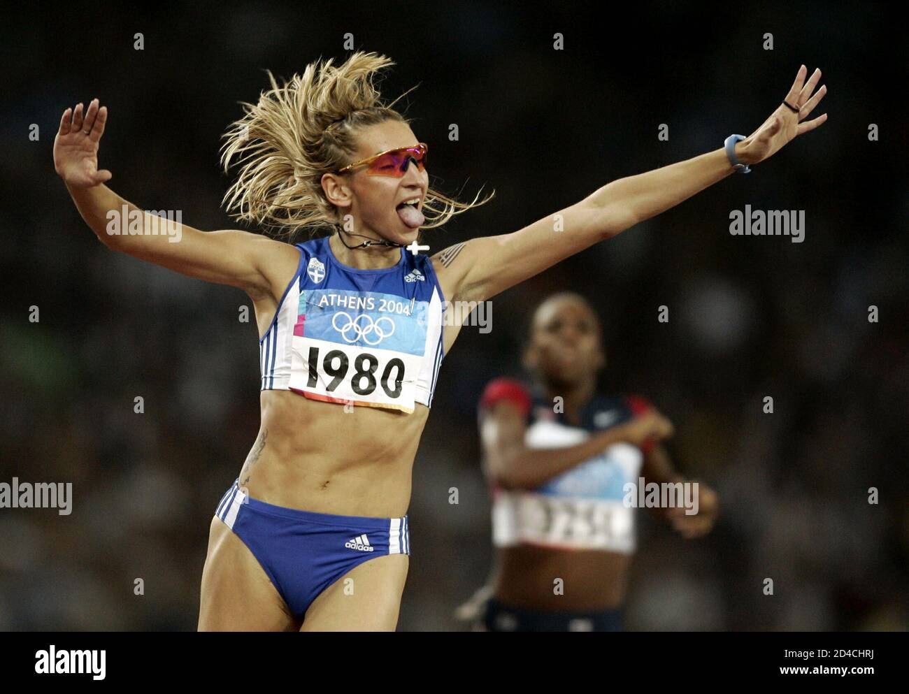 Greece's Fani Halkia celebrates her victory in the women's 400 metres  hurdle semi-final event at the Athens 2004 Olympic Summer Games August 22,  2004 Stock Photo - Alamy