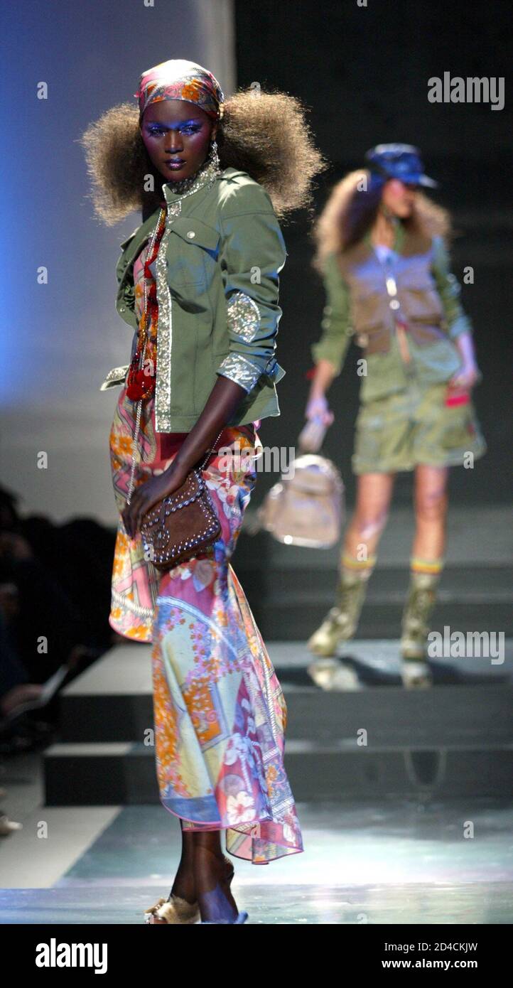 Majroe forsigtigt Forfølge A model wears a creation by Christian Dior during the closing week of Dubai  Fashion 2005 presented by Burjuman Mall at the Royal Mirage Hotel in Dubai  February 8, 2005. The event
