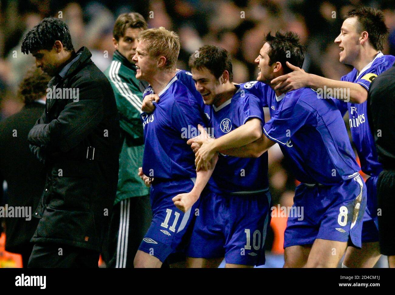 Chelsea S Damien Duff 2l Is Congratulated By Team Mates 3l R Joe Cole Frank Lampard And John Terry After Scoring As Barcelona S Coach Frank Rijkaard L Walks Away During Their Champions League First