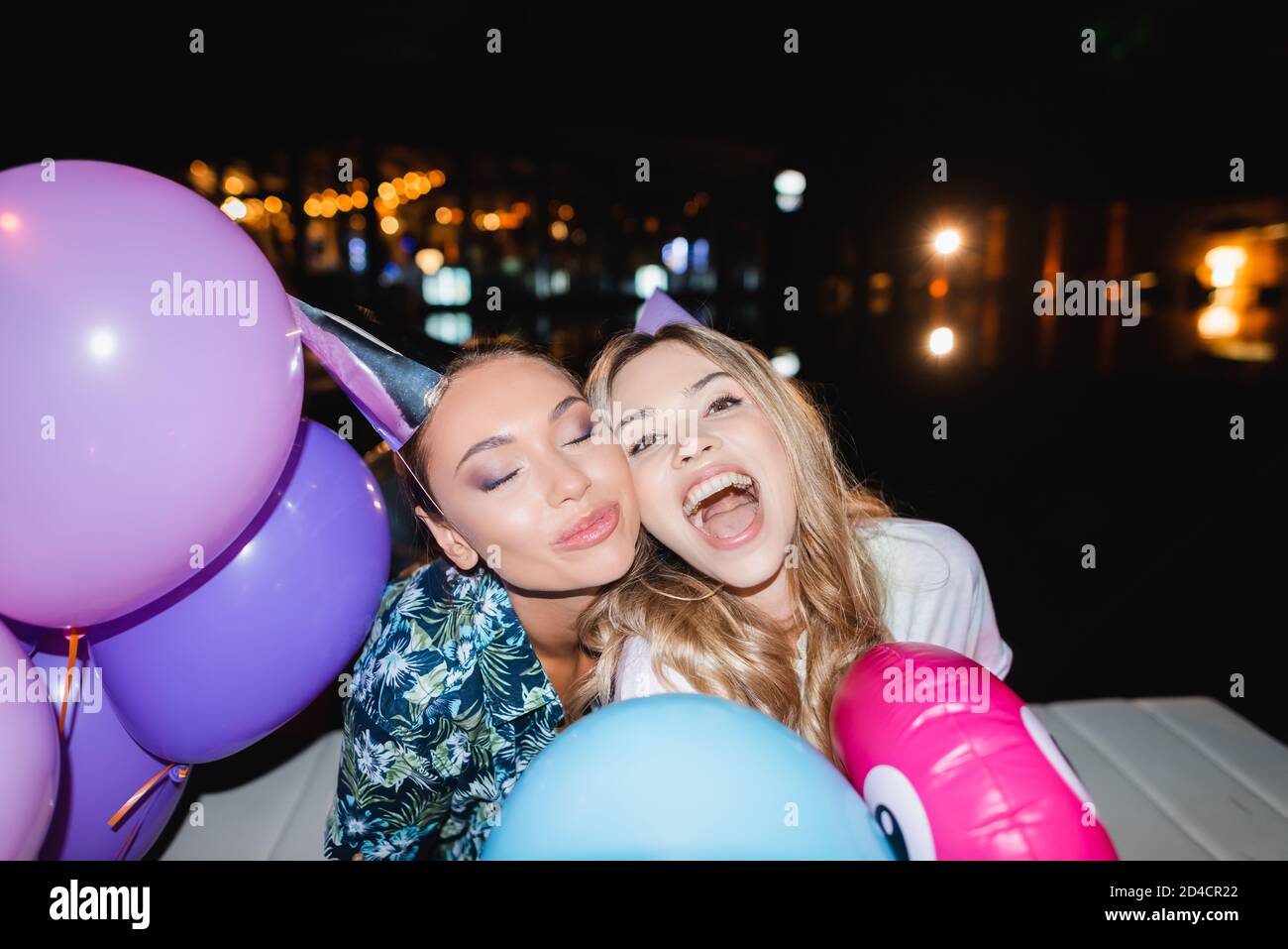 Young women at party hi-res stock photography and images - Alamy