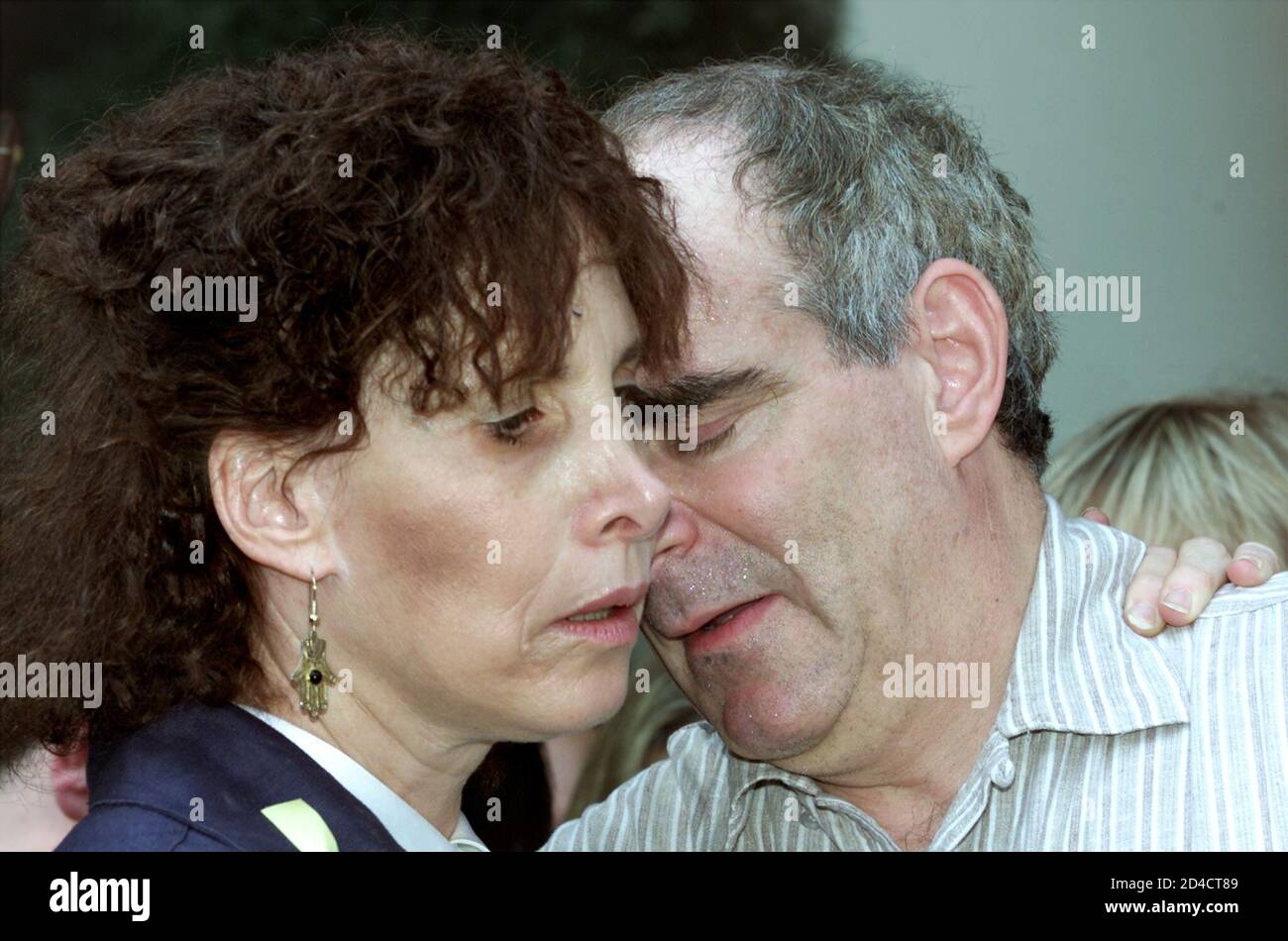 Susan and Robert Levy, parents of Chandra Levy, listen during a press  conference with Washington attorney Billy Martin (not shown) in Washington,  June 21, 2001. Martin announced that a team of investigators
