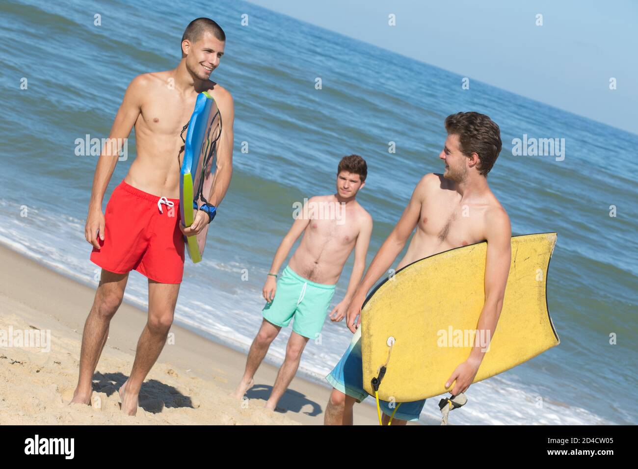 bodyboard men on the beach a Stock Photo Alamy