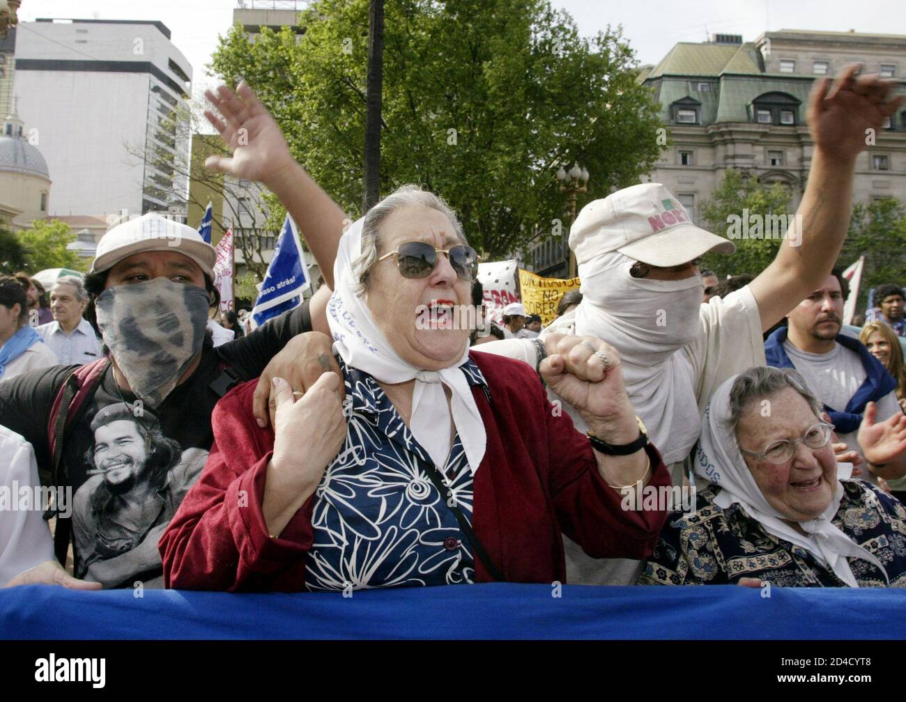 Hebe De Bonafini C A Leader Of The Humans Rights Group Mothers Of The Plaza De Mayo March Alongside Masked Activists By The Plaza De Mayo Square Where Hundreds Gathered To Demand