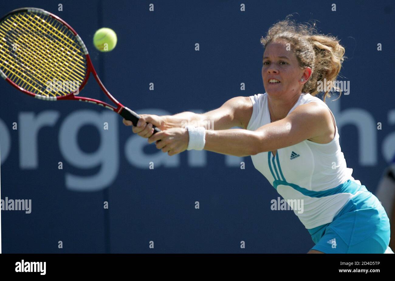 Patty Schnyder of Switzerland hits a return to Daniela Hantuchova of the  the Slovakia during their