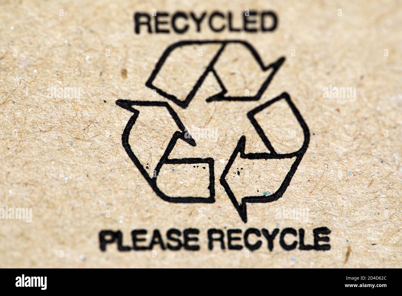 Please recycle logo on a cardboard box Stock Photo