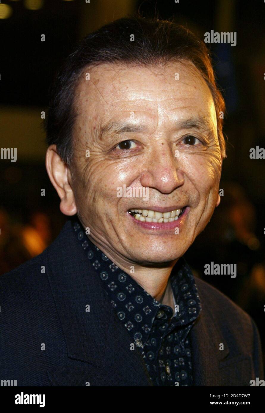 Asian-American actor James Hong arrives for the premiere of 'Kung Fu Hustle' at the Arclight Cinerama Dome theatre in Hollywood March 29, 2005. Stock Photo
