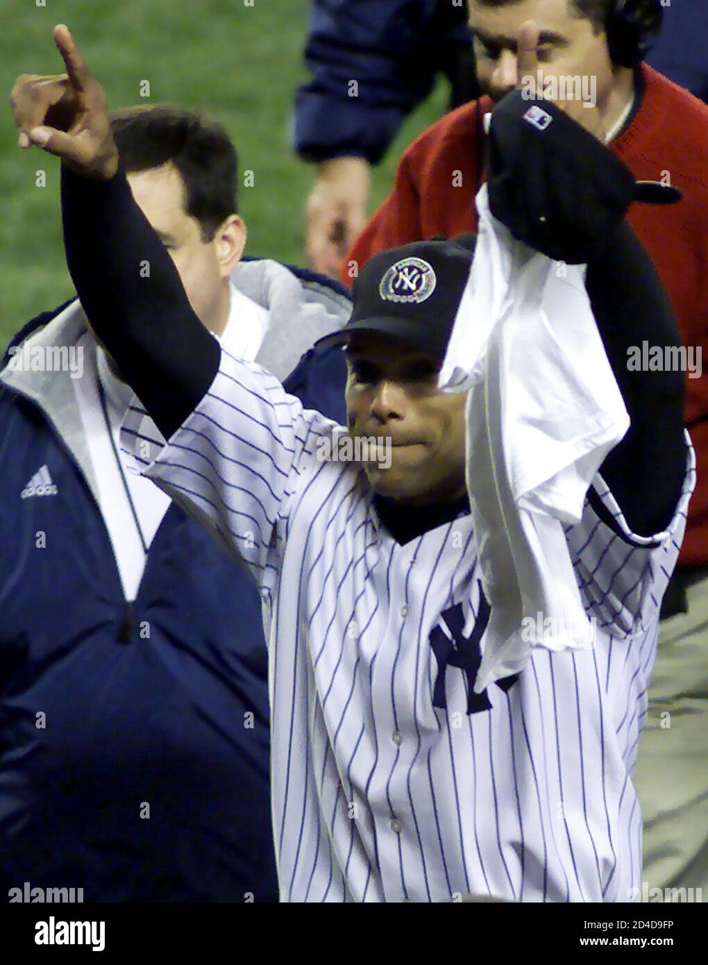 New York Yankees Left Fielder David Justice Celebrates As He Leaves The Field After The Yankees Won The American League Championship Over The Seattle Mariners By Winning Game 6 Of The American