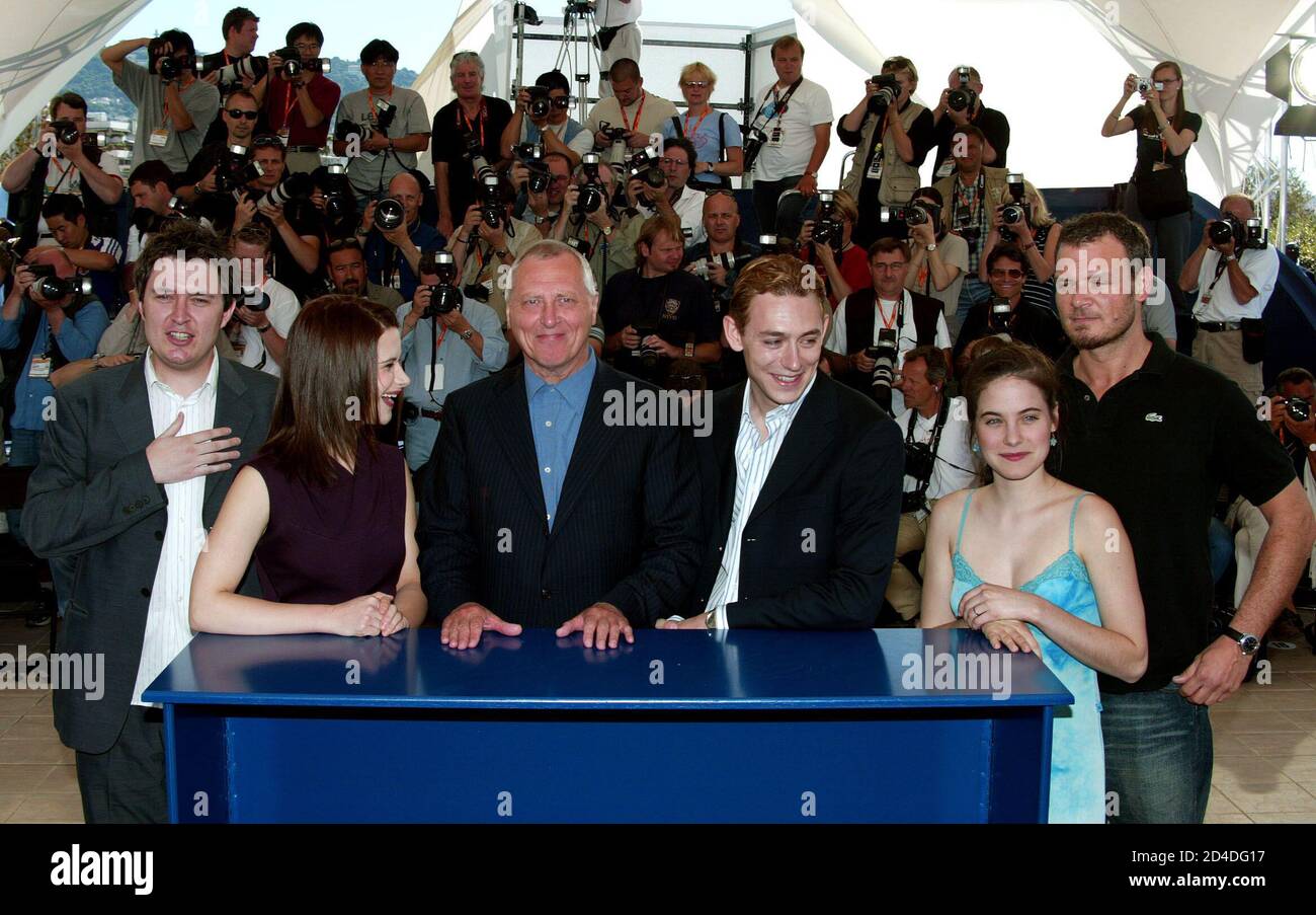 British director Peter Greenaway (C) poses with cast during a photocall for  his film "The Tulse Luper Suitcases, Part I. The Moab Story" at the 56th  International Film Festival in Cannes, May