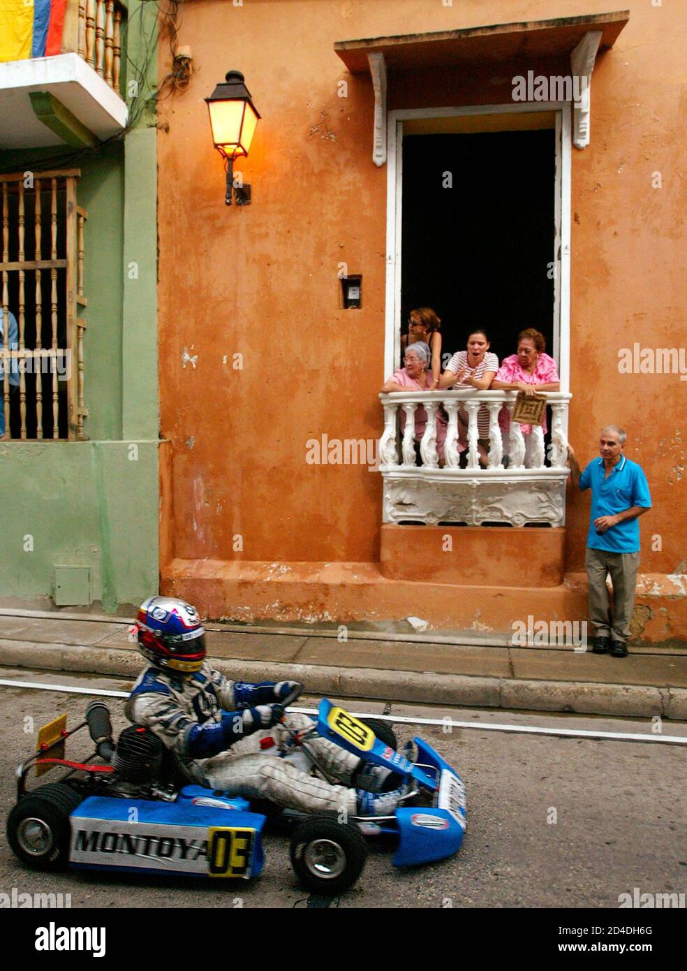 Colombia's Formula One driver Juan Pablo Montoya drives his cart on an  historic street during an exhibition race in the Caribbean port city of  Cartagena, November 15, 2003. Drivers from the Formula