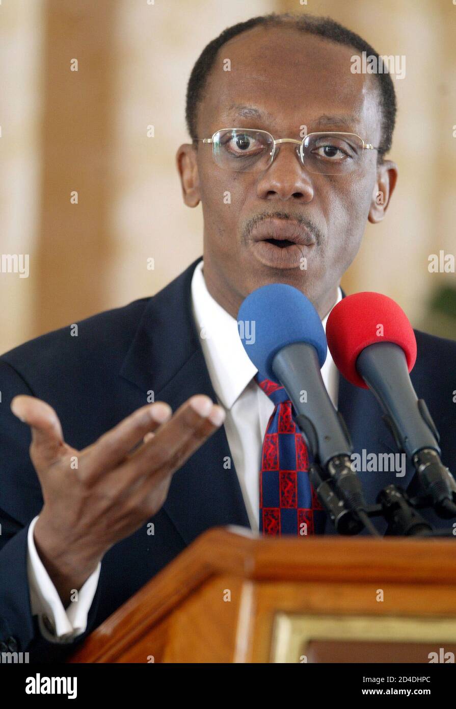 Tub Harmful Regulation Haitian President Jean-Bertrand Aristide speaks during a press conference  at the Presidential Palace, known as the White House, in Port au Prince  February 24, 2004. [Aristide appealed for international help to deal