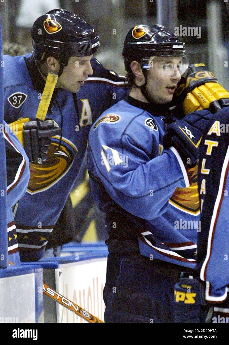 Atlanta Thrashers left wing Ilya Kovalchuk (R) is hugged by teammate Dany  Heatley (L) after their win over the New York Rangers in Atlanta February  29, 2004. Kovalchuk had two goals as